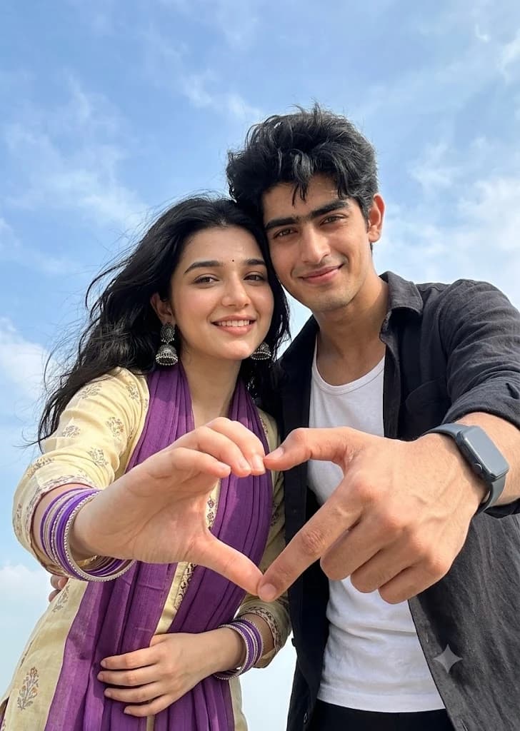 Candid Romantic Couple Heart Gesture Portrait